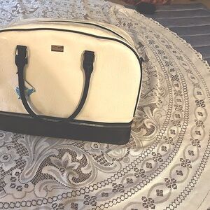 Reserved 
Elegant White and Black Carryon Bag.